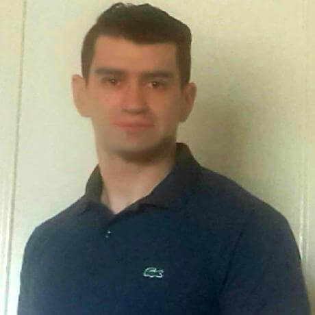 James Bishop looking sharp in
          polo shirt.